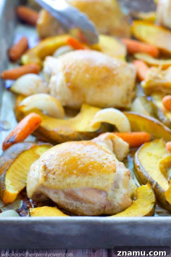 This comforting roast chicken is brushed with an unbelievable maple-mustard sauce and roasted to perfection with fall veggies. @WholeHeavenly