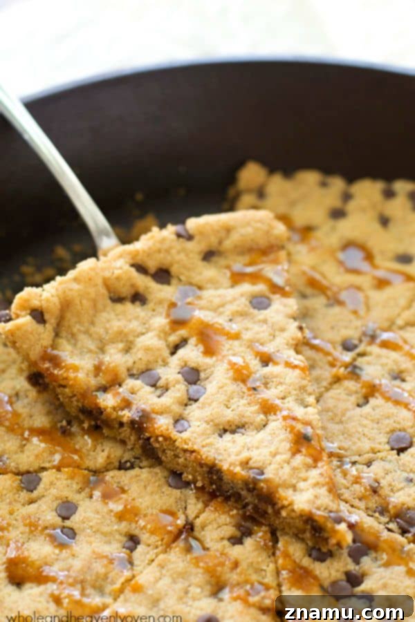 Gooey Flourless Caramel Chocolate Chip Skillet Cookie 2 Indulge in a giant flourless caramel chocolate chip skillet cookie – extra chewy, incredibly gooey, and baked to perfection in a single skillet. Perfect for sharing or a truly personal treat! @WholeHeavenly