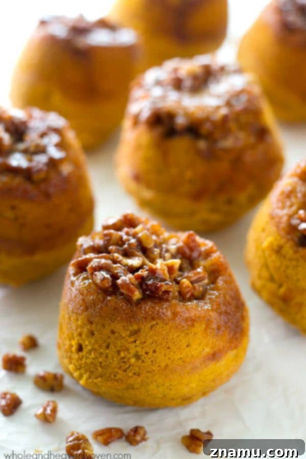 Gooey Pecan Pumpkin Flip Muffins 5 Close-up of the sticky pecan topping on a pumpkin muffin, ready to be enjoyed.