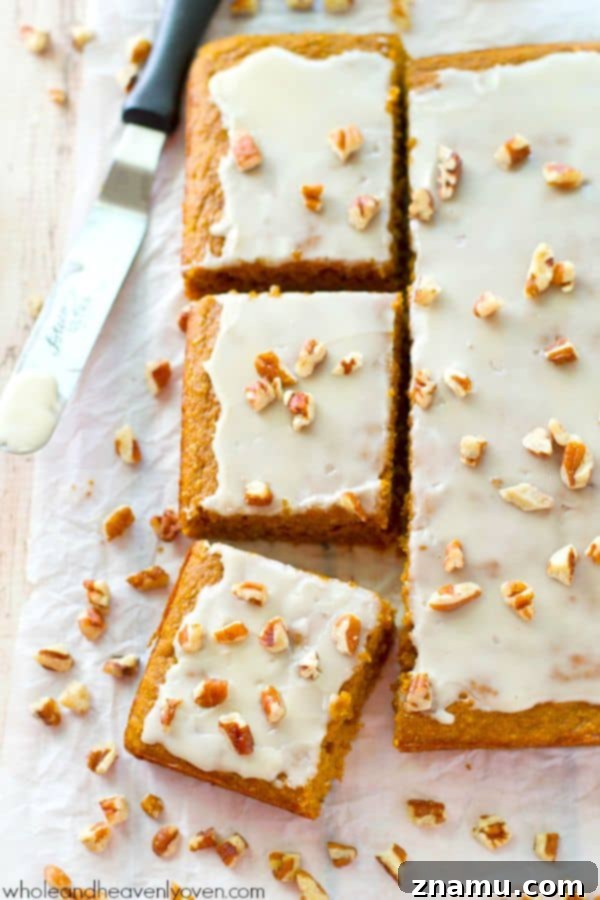 Gooey Pecan Pumpkin Flip Muffins 10 Soft pumpkin spice cake bars covered with a luscious glaze, perfect for fall.