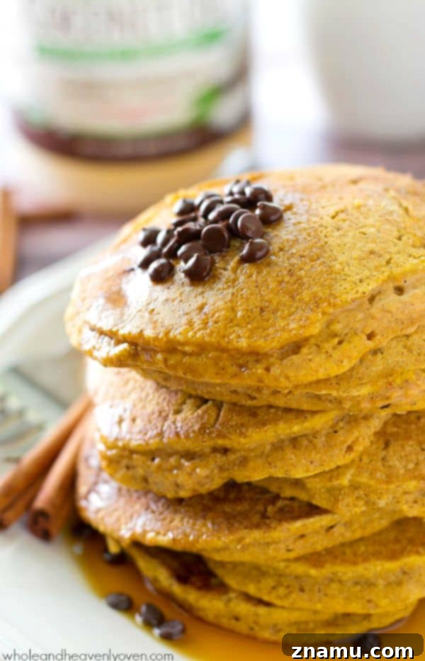 Autumn's Coconut Pumpkin Spice Pancakes 4 Buttermilk pumpkin spice pancakes ready for a cozy autumn breakfast.
