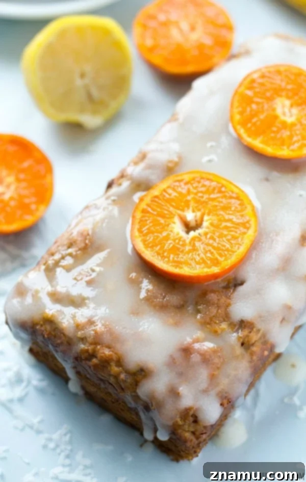 Cinnamon Streusel Banana Coffee Cake 12 A loaf of soft Tropical Banana Bread with a vibrant citrus glaze, offering a taste of paradise in every bite.