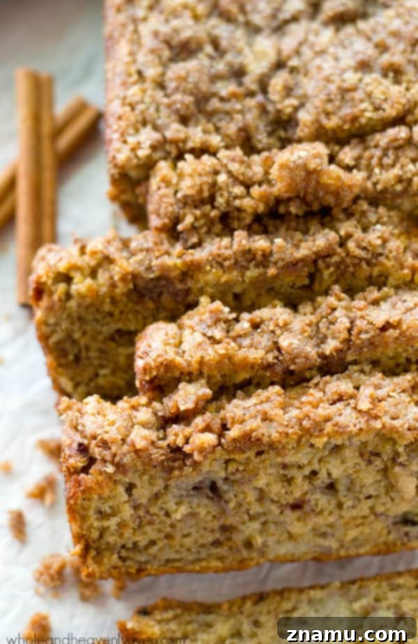 Cinnamon Streusel Banana Coffee Cake 3 Close-up of the delicious streusel topping on freshly baked Cinnamon Streusel Coffee Cake Banana Bread, highlighting the golden brown crumbs.
