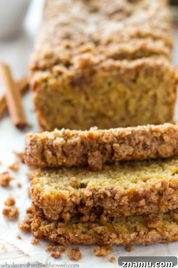 Cinnamon Streusel Banana Coffee Cake 6 Two freshly baked loaves of Cinnamon Streusel Coffee Cake Banana Bread, cooling on a wire rack, with a glorious golden streusel topping.