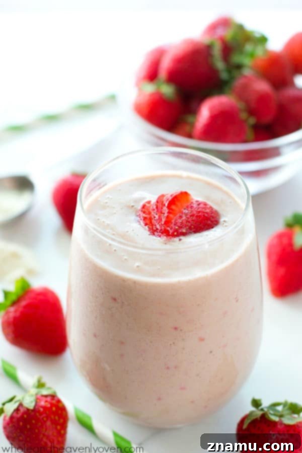 PB&J Power Up Smoothie 7 A visually appealing shot of the Peanut Butter and Jelly Protein Smoothie, highlighting its vibrant colors and frothy top.