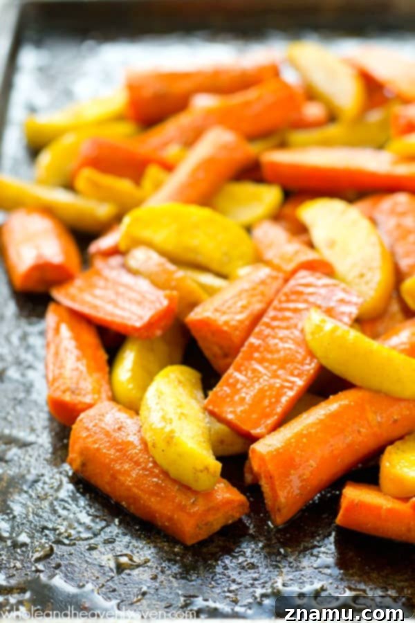 Moroccan Maple Caramelized Carrots and Apples 2 Moroccan Maple-Roasted Carrots and Apples: a vibrant, sweet, and savory fall side dish bursting with flavor from maple syrup and exotic Moroccan spices.