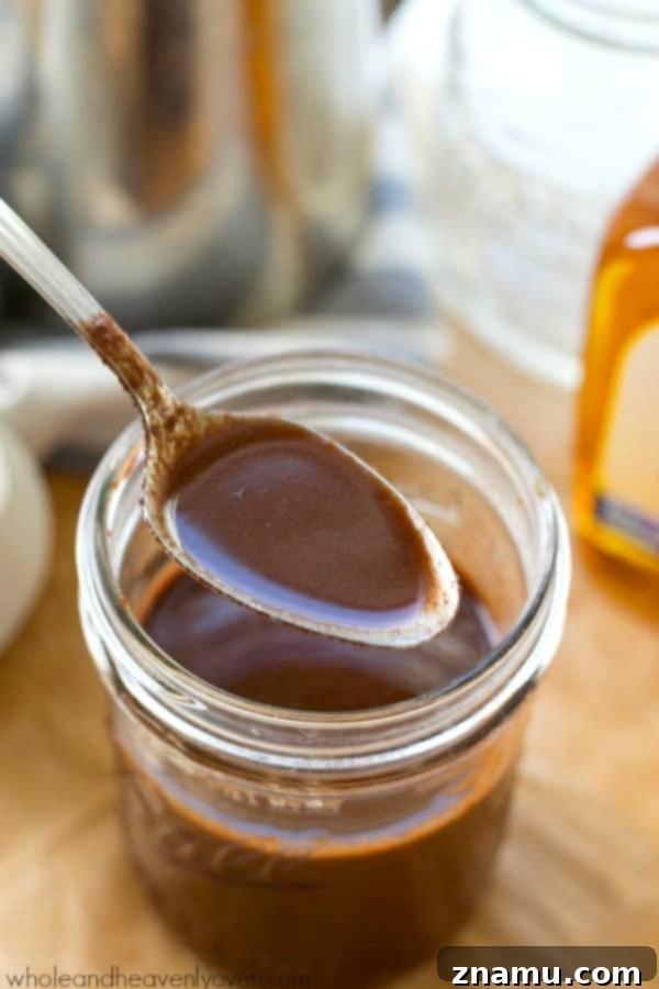 Easy 4-Ingredient Agave Mocha Coffee Syrup 2 Delicious homemade agave mocha coffee syrup poured into a glass jar.