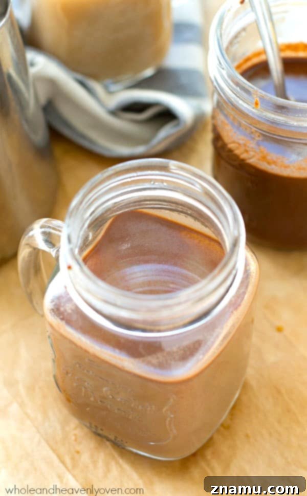 Easy 4-Ingredient Agave Mocha Coffee Syrup 4 Close-up of a glass jar filled with luscious Agave Mocha Coffee Syrup.