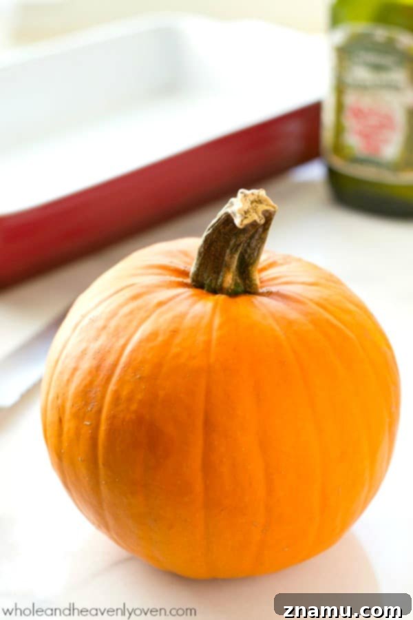 Whip Up Fresh Homemade Pumpkin Puree 4 Step-by-step instructions for preparing your pumpkin for roasting, including how to cut the stem and halve the pumpkin for easy processing. @WholeHeavenly