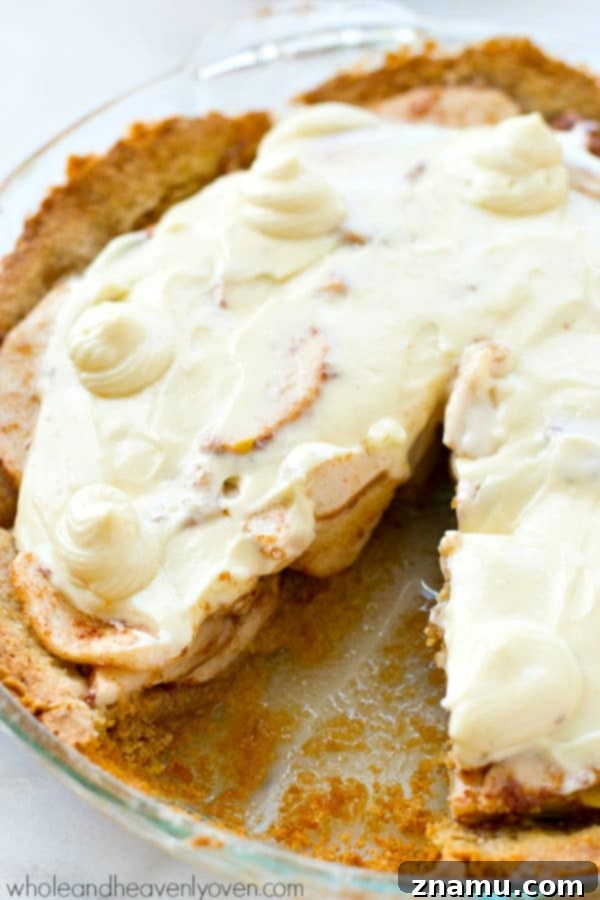 Cinnamon Sugar Apple Cheesecake Dream 6 Three layers of Snickerdoodle Apple Cheesecake Pie clearly visible on a plate
