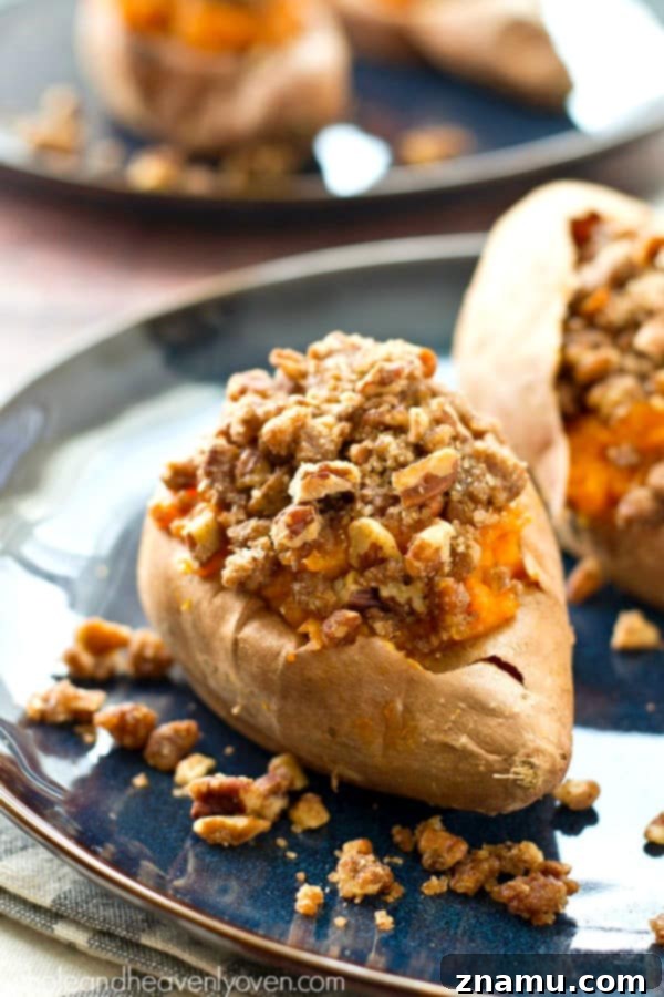 Creamy Twice-Baked Sweet Potatoes with Crunchy Pecan Streusel 7 A single, beautifully golden twice-baked sweet potato, showcasing the rich pecan streusel.