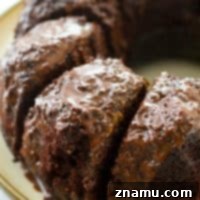 Decadent Birthday Chocolate Bundt Cake 9 Drizzled with chocolate ganache glaze and unbelievably fudgy and moist inside, this chocolate bundt cake definitely lives up to it's name of
