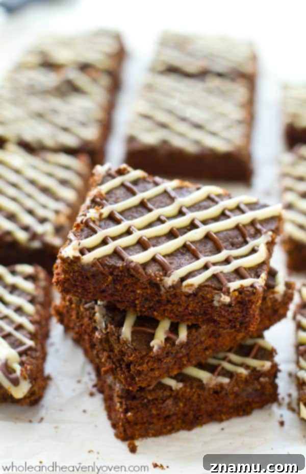 Decadent Triple Chocolate Chewy Bars 2 Irresistibly soft and chewy triple chocolate cookie bars, a dream for any chocolate lover. Loaded with three kinds of chocolate to satisfy the biggest sweet tooth. @WholeHeavenly