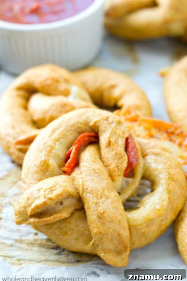 Richly Herbed Hummus with Roasted Garlic and Three Cheeses 12 Exploding with gooey cheese and pepperoni slices, these crowd-pleasing soft pretzels are guaranteed to disappear the second you put them out!