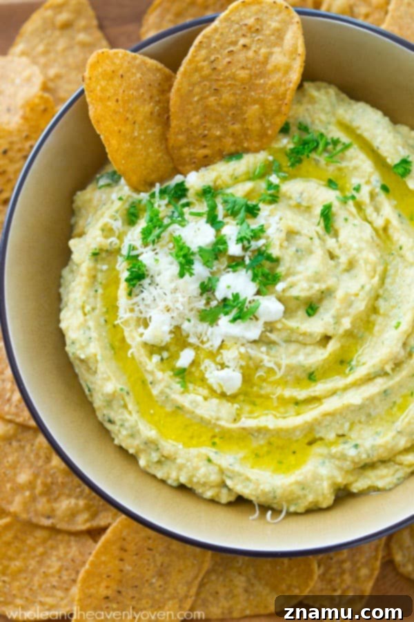 Richly Herbed Hummus with Roasted Garlic and Three Cheeses 6 A trio of cheeses, homemade roasted garlic, and fresh herbs star in this super-easy and unbelievably smooth hummus.---It's the perfect dip for any holiday appetizer table! @WholeHeavenly