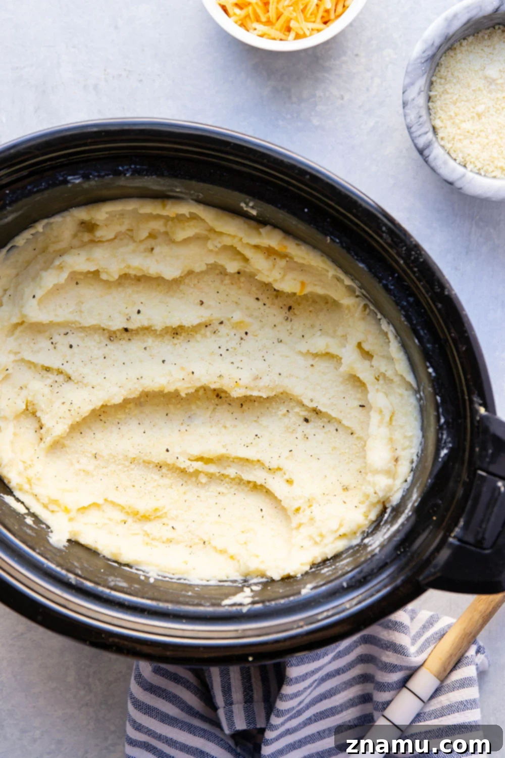 Decadent Slow Cooker Three Cheese Mashed Potatoes 3 Made completely in the crockpot and packed with a triple whammy of cheese, these three cheese mashed potatoes are perfectly creamy and the easiest side dish!