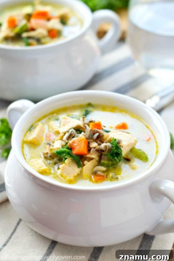 Creamy Turkey Wild Rice Revival 6 Serving of Creamy Turkey Wild Rice Soup garnished with fresh parsley