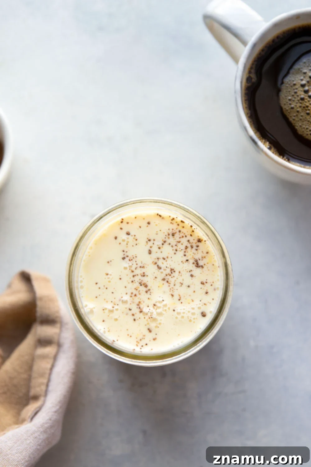 Spiced Eggnog Coffee Delight 2 Elevate your coffee with this homemade eggnog coffee creamer. Rich, creamy, and spiced to perfection for the holidays!