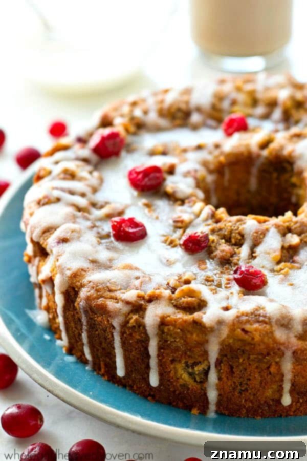 Cranberry Cheesecake Ripple Coffee Cake 3 Swirled with a luscious cheesecake filling and topped with streusel and lots of glaze, this cranberry cheesecake swirl coffee cake is the ultimately impressive holiday breakfast! @WholeHeavenly