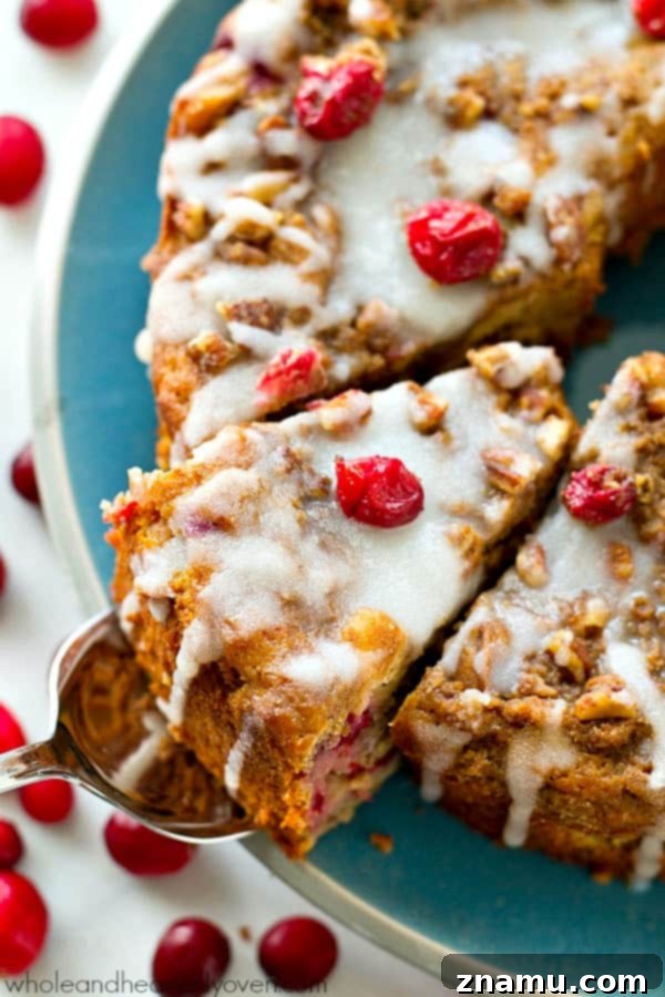 Cranberry Cheesecake Ripple Coffee Cake 4 Swirled with a luscious cheesecake filling and topped with streusel and lots of glaze, this cranberry cheesecake swirl coffee cake is the ultimately impressive holiday breakfast! @WholeHeavenly