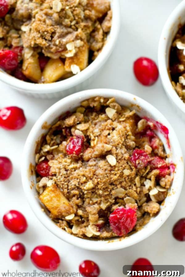 Mini Pear Cranberry Crisps for One 4 A selection of baked mini pear cranberry crisps cooling on a rack, ready to be served.