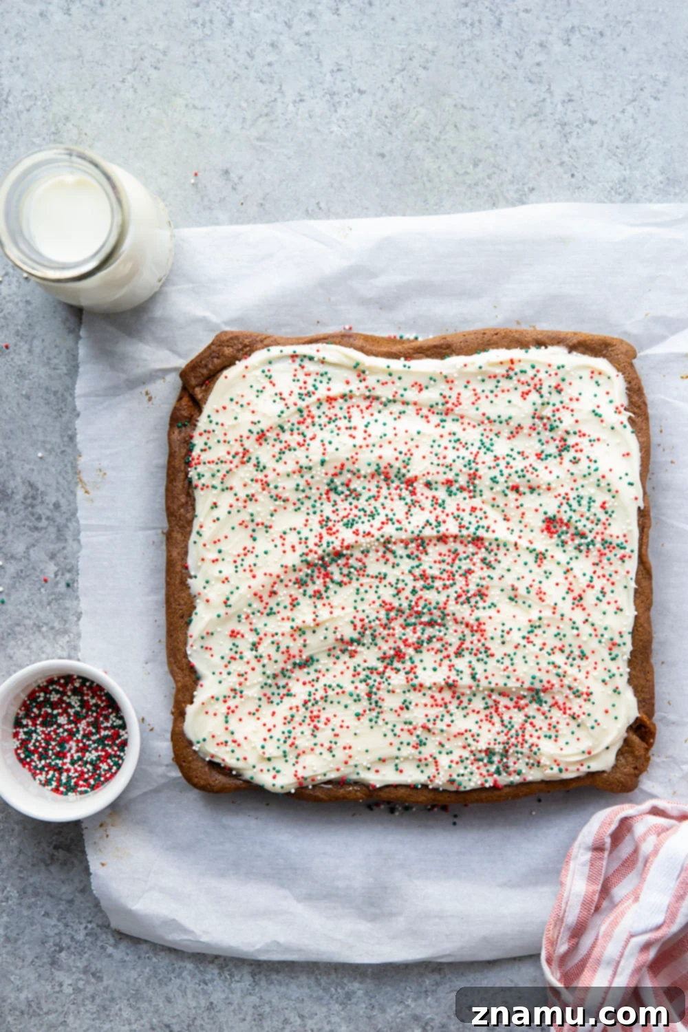 Chewy Ginger Spice Bars 3 These soft and chewy gingerbread cookie bars are topped with a rich cream cheese frosting and absolutely melt in your mouth!
