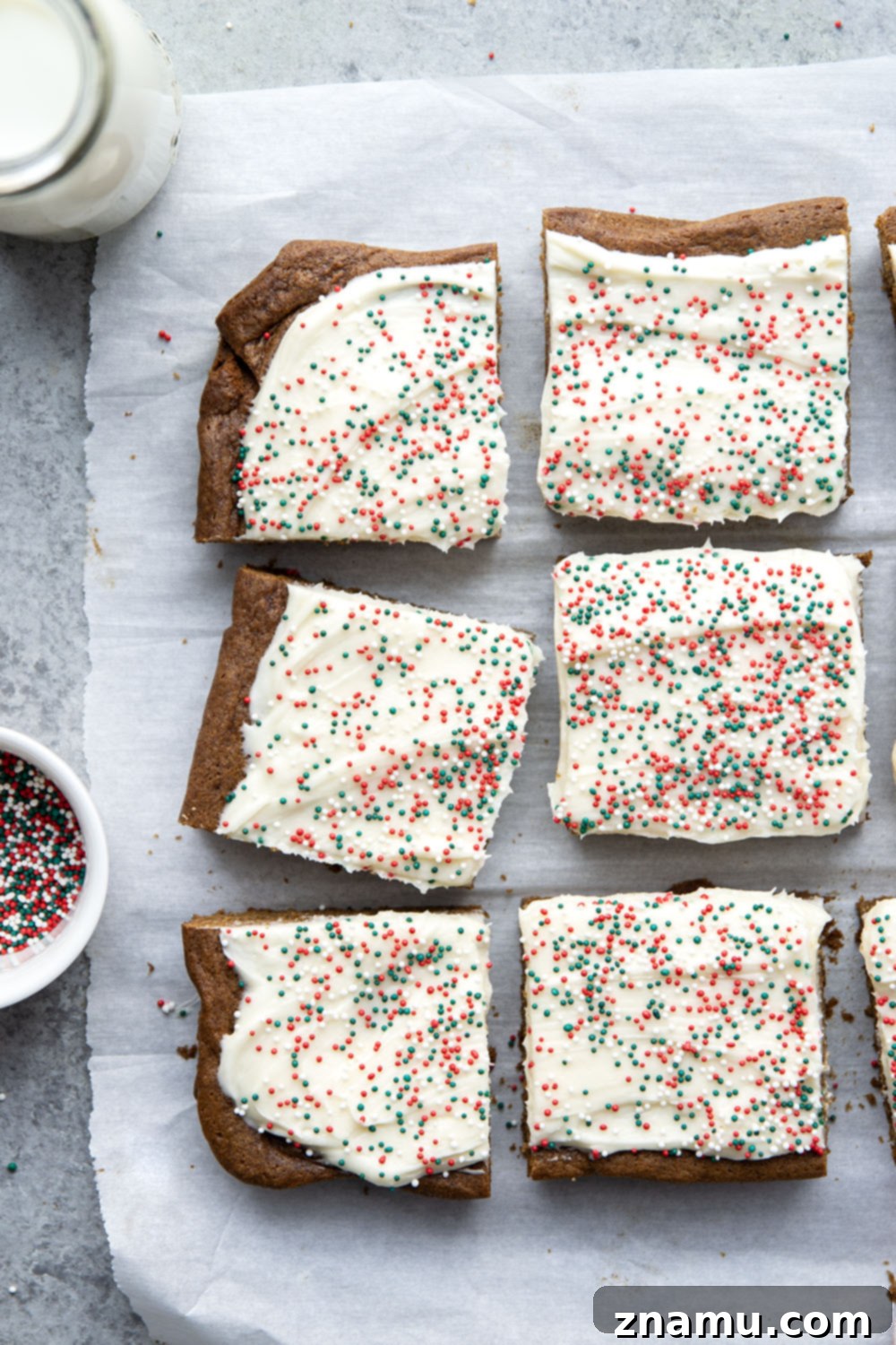 Chewy Ginger Spice Bars 4 These soft and chewy gingerbread cookie bars are topped with a rich cream cheese frosting and absolutely melt in your mouth!