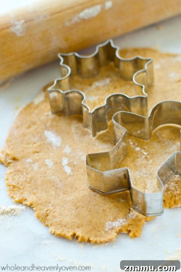 Coconut-Infused Eggnog Sugar Cookie Cut-Outs 4 Plate of decorated coconut oil eggnog sugar cookies, ready for holiday festivities.