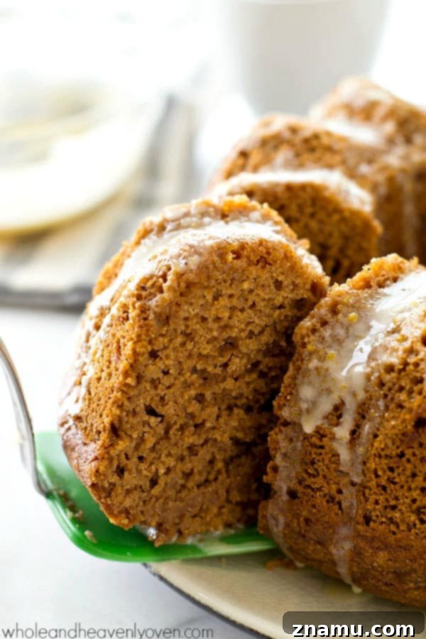 Festive Gingerbread Bundt with Citrus Glaze 3 Gingerbread Bundt Cake sliced, revealing its moist texture and rich spice