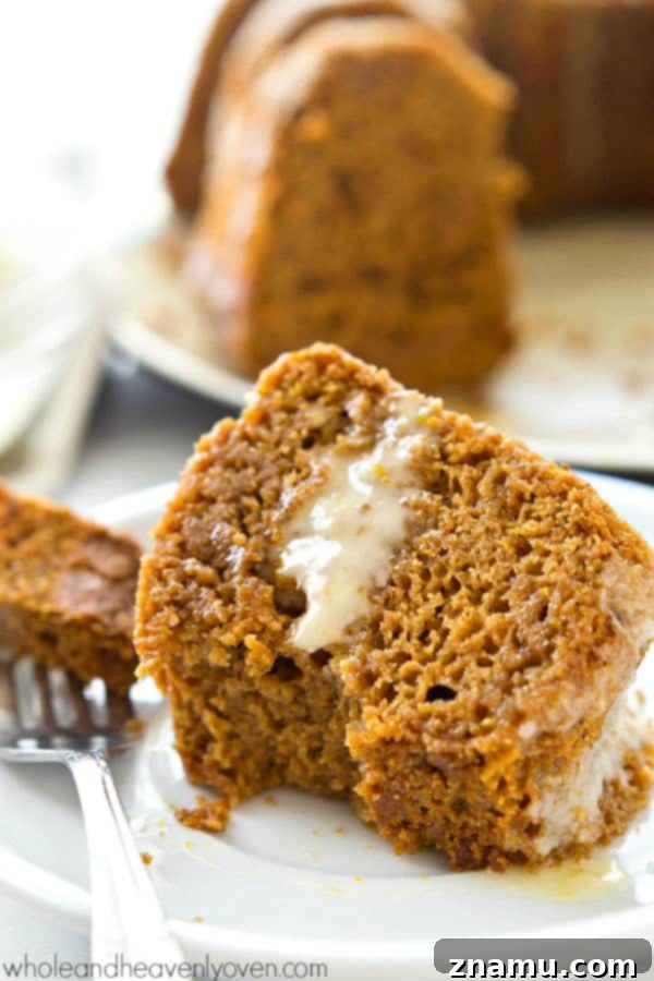 Festive Gingerbread Bundt with Citrus Glaze 6 Slice of Gingerbread Bundt Cake on a plate, ready to be enjoyed