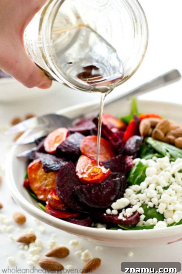 Vibrant Maple Roasted Root and Spinach Salad 7 Assembling maple roasted beet and carrot spinach salad