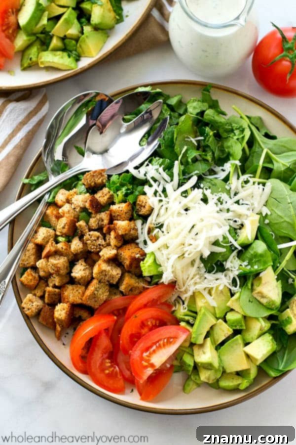 Bright Avocado Spinach Caesar with Tangy Buttermilk Dressing 3 Close-up of fresh Avocado Spinach Caesar Salad with light buttermilk dressing and homemade croutons
