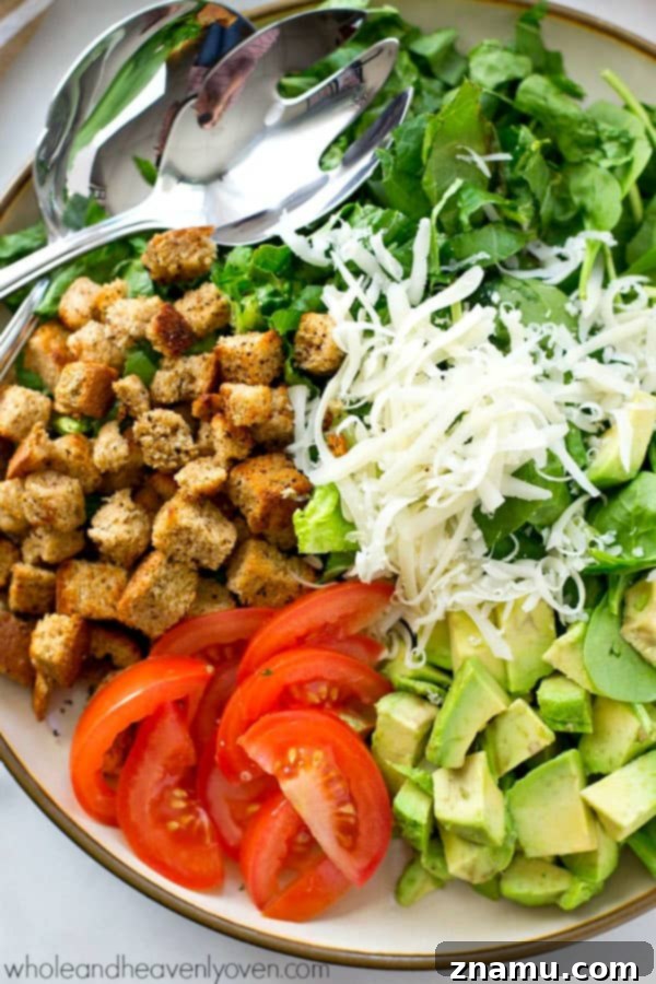 Bright Avocado Spinach Caesar with Tangy Buttermilk Dressing 4 Avocado Spinach Caesar Salad served in a bowl, showing the vibrant greens and creamy dressing