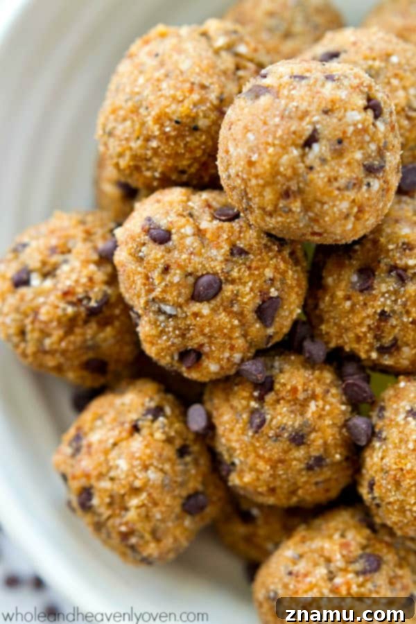 Assortment of banana bread chocolate chip energy bites on a baking sheet