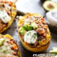 These chili spaghetti squash boats are loaded to the max with a hearty turkey chili and baked with plenty of gooey cheese on top.