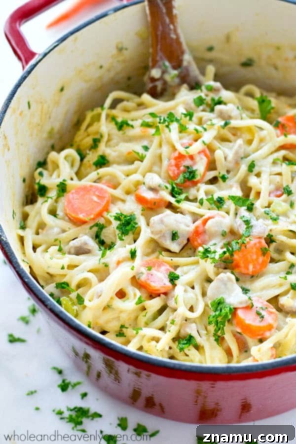 Creamy One-Pot Chicken Pot Pie Fettuccine 2 Creamy One-Pot Chicken Pot Pie Fettuccine, a quick and easy 35-minute dinner recipe.