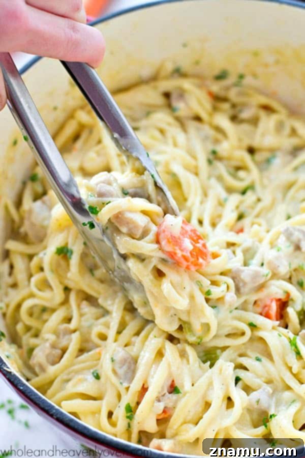 Creamy One-Pot Chicken Pot Pie Fettuccine 6 Generous serving of One-Pot Chicken Pot Pie Fettuccine in a bowl.