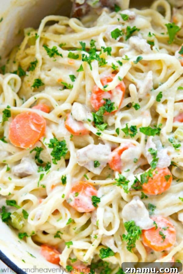 Creamy One-Pot Chicken Pot Pie Fettuccine 7 Close-up of the creamy texture of One-Pot Chicken Pot Pie Fettuccine.