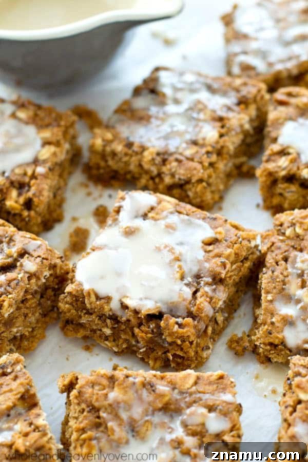 Frosted Multi-Grain: Your Perfect Morning Bite 4 Several frosted multi-grain breakfast bars stacked on a plate, ready for a grab-and-go healthy snack.