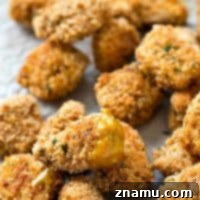 Golden Crunch Baked Chicken Bites with Zesty Honey Mustard 9 Extra-Crispy Baked Chicken Nuggets with Honey Mustard Dip