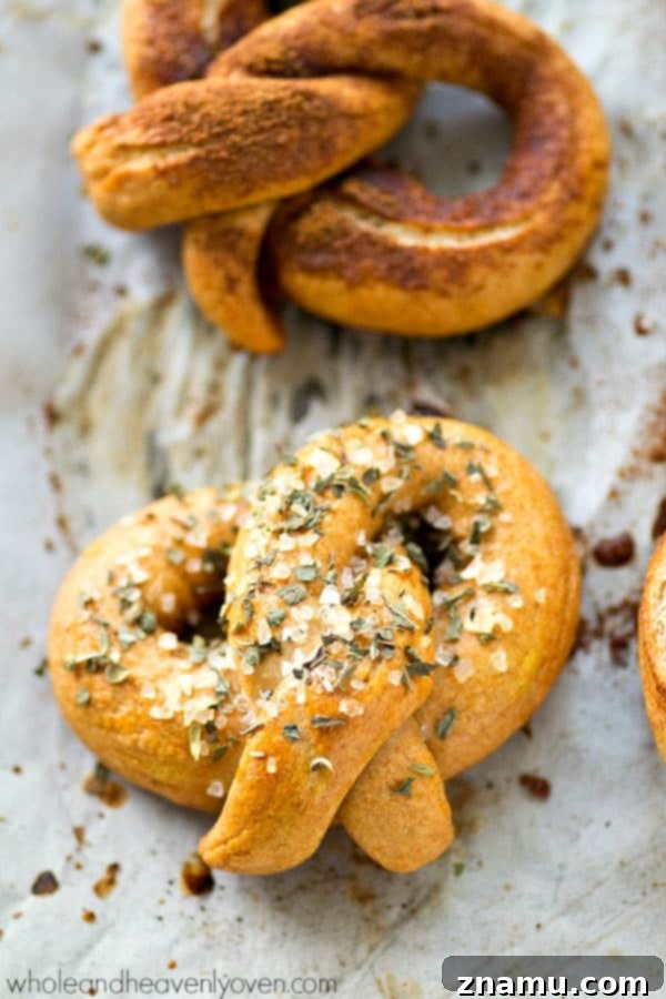 Unlock the World of Perfect Soft Pretzels 3 A close-up of fresh, raw pretzel dough twisted into perfect shapes, ready for baking.