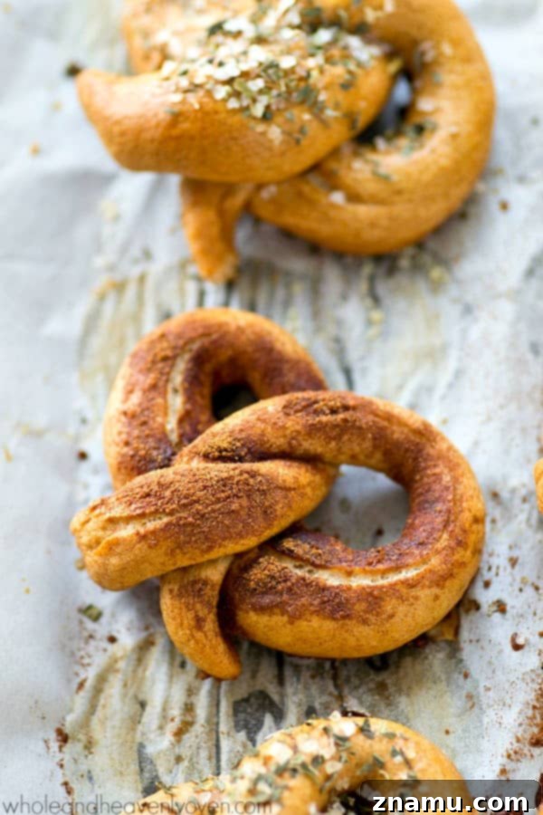 Unlock the World of Perfect Soft Pretzels 5 Hands demonstrating the pretzel shaping technique, twisting dough ropes.