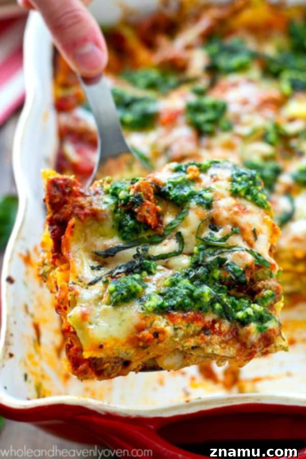 Triple Cheese Pesto Turkey Bake 7 A close-up view of the lasagna layers after baking, showcasing the tender noodles and melted cheese