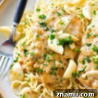 A small image showing the Slow Cooker 40-Clove Garlic Chicken ready to be served.