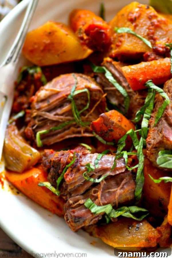 A family-sized portion of Italian pot roast, ready to be served from the slow cooker.