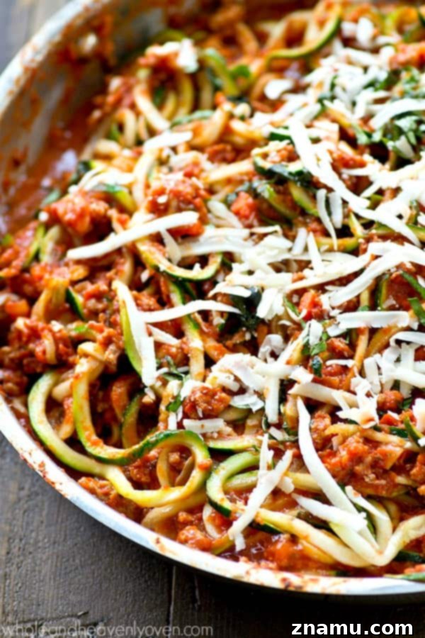 30-Minute Turkey Zoodle Bolognese 5 Hearty Turkey Bolognese sauce simmering in a skillet