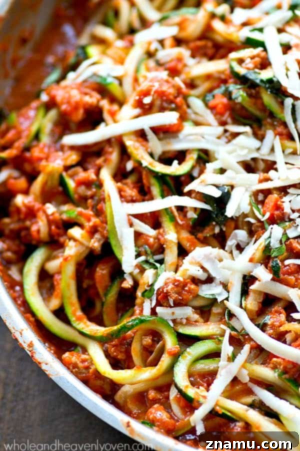 30-Minute Turkey Zoodle Bolognese 7 Serving of Turkey Bolognese with Zucchini Noodles and grated Parmesan