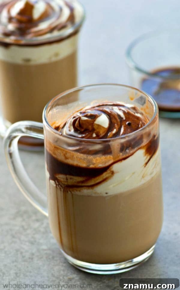 Close-up of a frothy Mint Mocha Latte, showcasing its rich texture and inviting aroma.