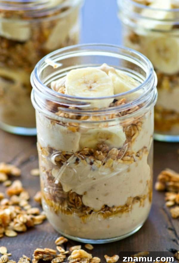 Banana Cream Pie Parfaits with Granola Crunch 5 A collection of beautifully assembled banana cream pie granola parfaits ready to be enjoyed.