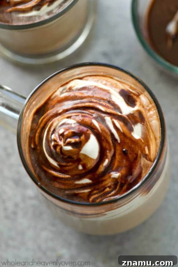 Warm Mocha Bread Pudding with Caramel Rum Drizzle 11 A refreshing 5-minute copycat mint mocha latte in a glass mug, topped with whipped cream and chocolate shavings.